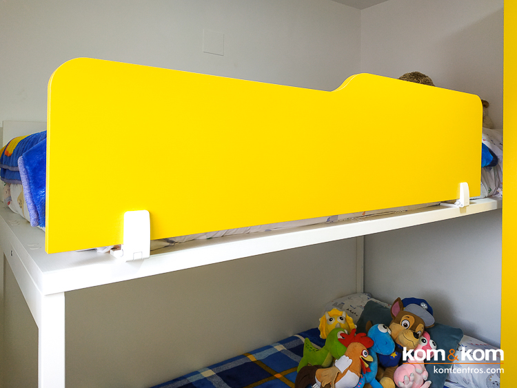 barrera de la cama de arriba de una litera infantil. Color: amarillo.